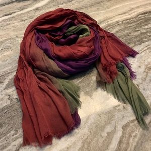 Colorful died long scarf is in shades of purple, red and green. NWT